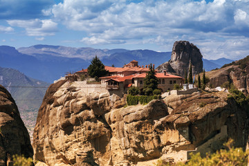 Landscape of monasteries of Meteora in Greece in Thessaly at the early morning. Cliffs of Meteora...