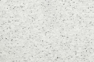 Obraz premium Real white-grey with black knitted fabric made of synthetic fibres textured background. Recycling of old things.