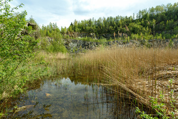 Obraz premium abandoned flooded quarry, Czech republic