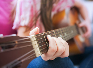 Fototapeta na wymiar Music woman play acoustic guitar