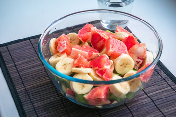 Fruit salad in transparent bowl