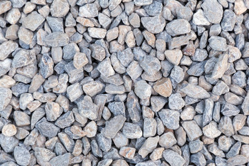 Stone pebbles texture background for interior exterior decoration and industrial construction concept design.