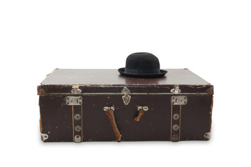 Suitcase and black hat