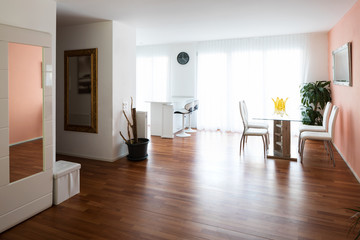 Fototapeta premium Dining room and entrace. Parquet floor