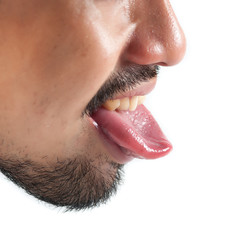 Man shows tongue isolated on white background