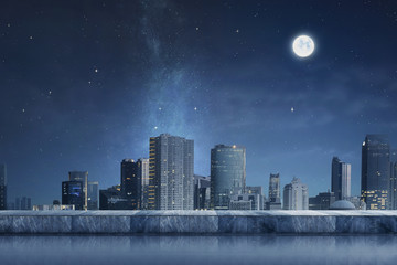 Naklejka premium Cityscape with night scene and moonlight
