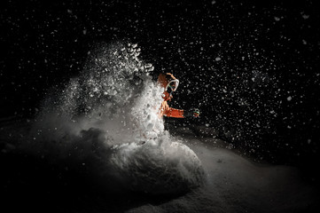 Freeride snowboarder jumping in snow at night - obrazy, fototapety, plakaty