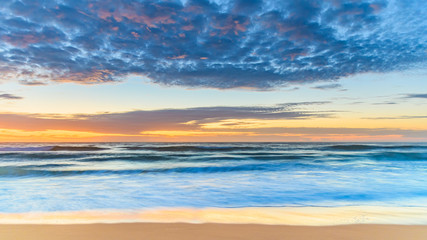 Fototapeta na wymiar Vibrant Sunrise Seascape