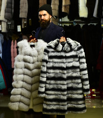 Businessman with hat and expensive overcoats.