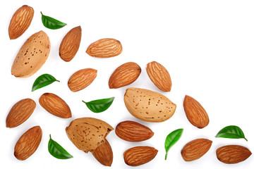 almonds with leaves isolated on white background with copy space for your text. Top view. Flat lay pattern