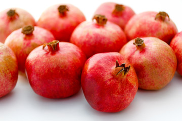 Group of pomegranates on white background