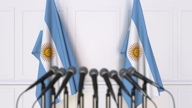 Argentinian official press conference. Flags of Argentina and microphones. Conceptual animation