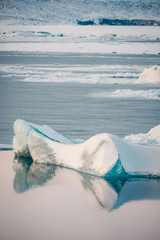 Obraz premium Winter landscape view of popular Glacier Lagoon with many small icebergs - Jokulsarlon, east Iceland.