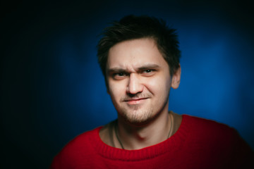 Obraz premium emotional young man photo in studio