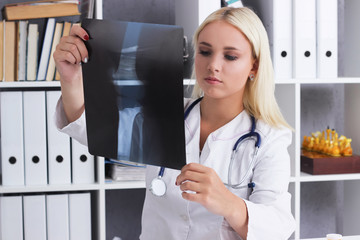 Fototapeta na wymiar woman doctor x-ray at the table medicine