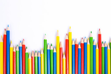  Colorful pencils pattern isolated on white background. Top view colorful of color pencils.Colored pencils, isolated on the white background. Color pencil with copy space isolated on white background,