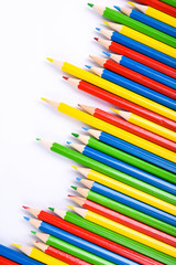  Colorful pencils pattern isolated on white background. Top view colorful of color pencils.Colored pencils, isolated on the white background. Color pencil with copy space isolated on white background,