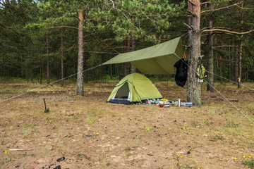 Tent on the sandy shore of the Gulf of Finland, Leningrad Region, Russia