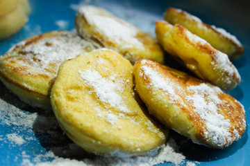 pancakes with a smile on a blue background.