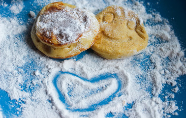 pancakes with a smile on a blue background.