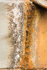 Rusty metal texture background with a weld seam.