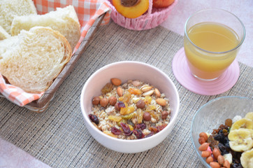 Healthy Breakfast: oatmeal, muesli, dried fruit, fruit juice, crispy bread top view