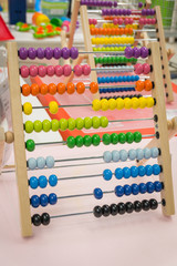 children's abacus on the table. Children's room, game, training