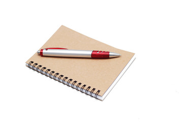 Notebook with pen isolated on white background