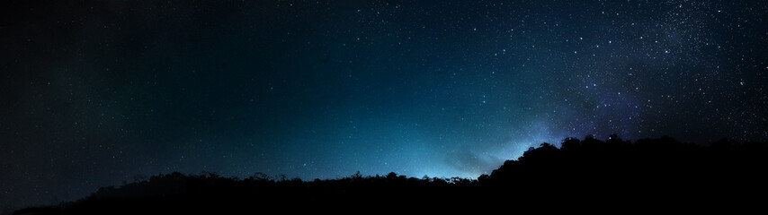Obraz na płótnie Canvas Mountain silhouette on Constellation Stars in the Universe Galaxy Background
