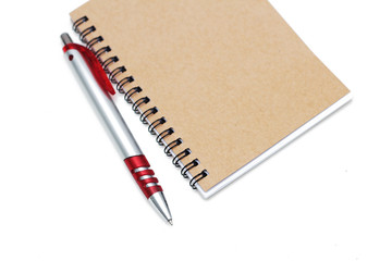 Notebook with pen isolated on white background