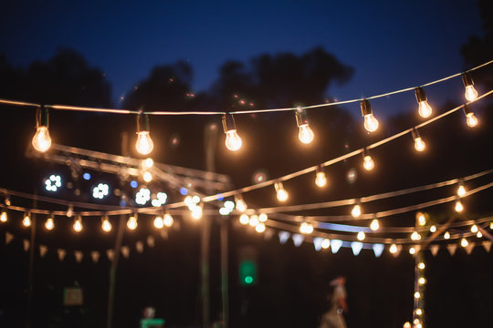 A garland of light bulbs in the decoration of the night ceremony
