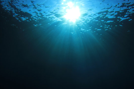 Underwater background sunburst