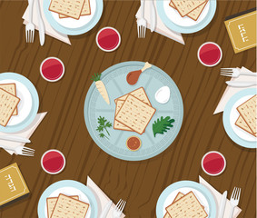 traditional passover table with passover plate and Haggadah book
