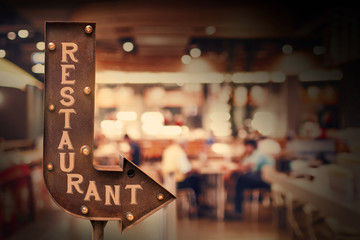 Restaurant signboard, in front of the store . Retro style