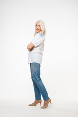 Fototapeta premium Full length portrait of a beautiful mature woman