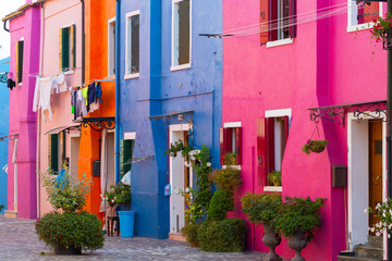 Colourfully painted house facade on Burano island,Venice, Italy