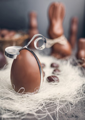 Delicious chocolate Easter egg with a ribbon