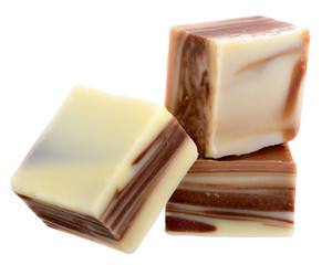 Cubes of black and white chocolate isolated