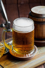 Light beer on an old background