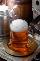 Light beer on an old background