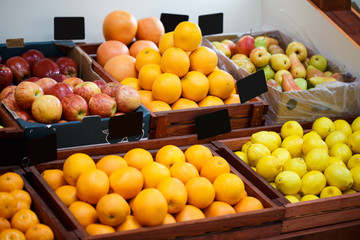 Shelf in the vegetable store with different kinds of fruit