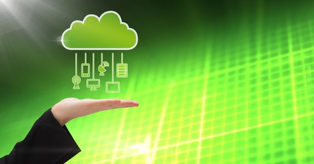Hand with cloud icon and hanging connection devices and green