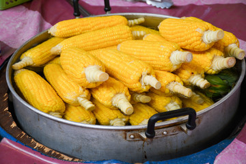 boiled corn in the pot.Thai market