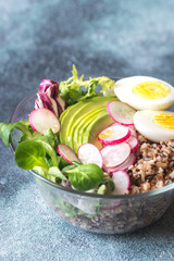 Obraz na płótnie Canvas Bowl of wild rice with avocado, egg and lettuce