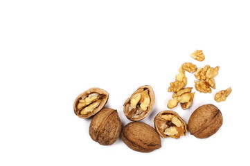 Cracked walnuts isolated on white background, top view