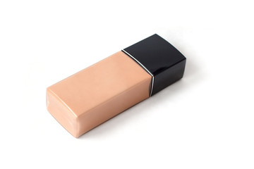 Tube with foundation cream isolated on white background