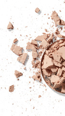 Broken face powder isolated on white background