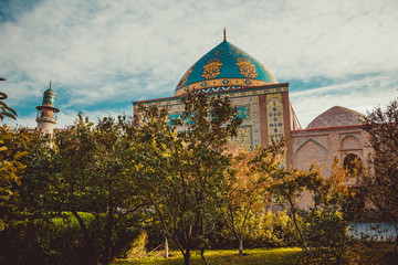 Blue mosque behind park. Elegant islamic masjid building. Travel to Armenia, Caucasus. Touristic architecture landmark. Sightseeing in Yerevan. City tour. Tourism industry. Religious concept