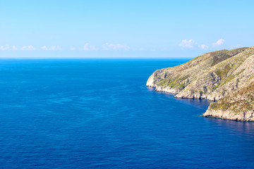 Fototapeta na wymiar Blue sea and cliff in Porto Schiza on Zakynthos island. Greece.