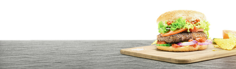 Hamburger - homemade burger with fresh vegetables on white background